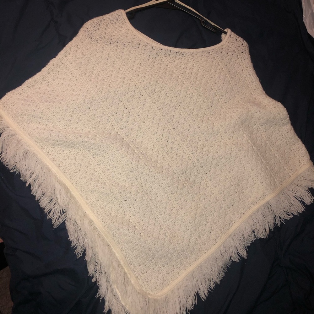 White crotchet poncho with fringe